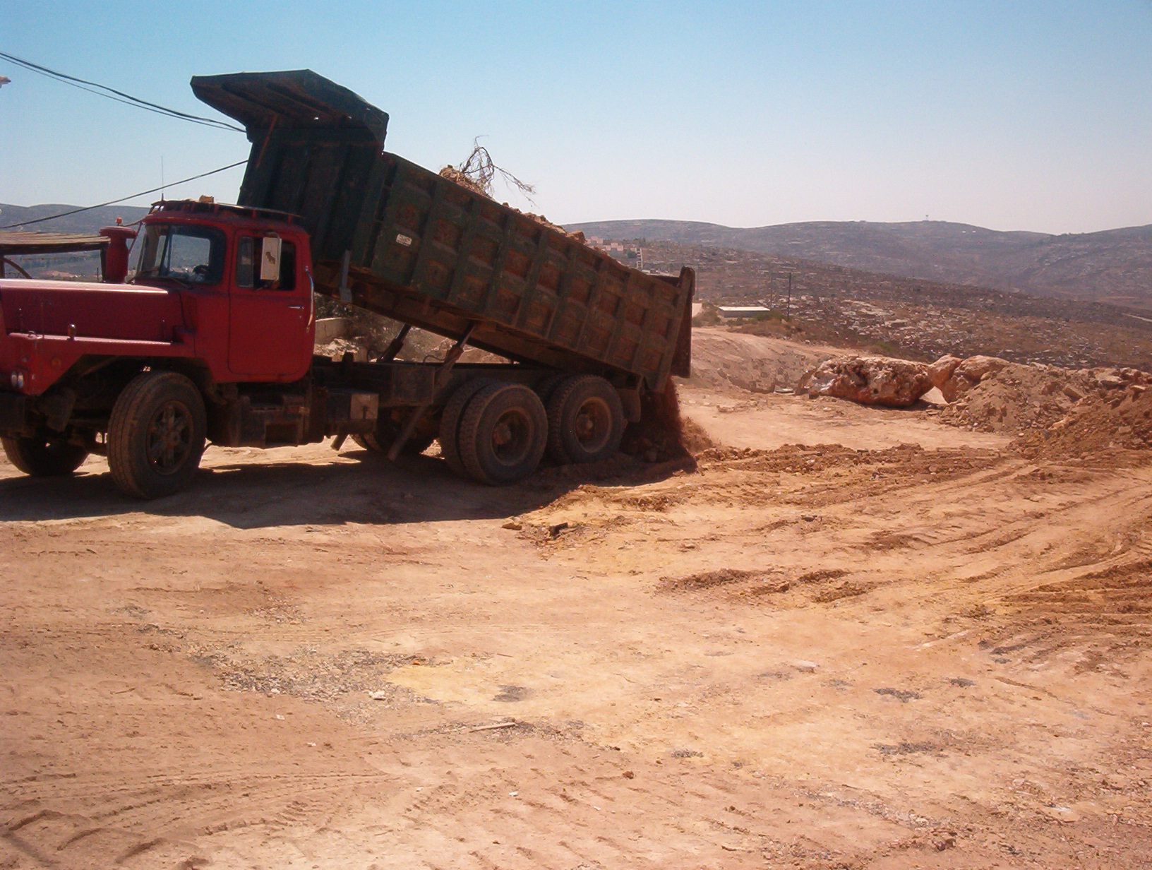 Dumping landfill on the site